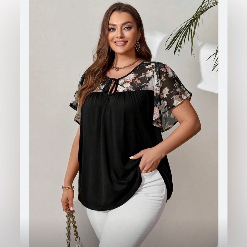 NWOT Black top with floral flutter sleeves size 2X and 3/4X 🌺.  BN 78
